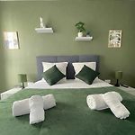 Q&R Renting - Appartement luxueux et Suites design- Parking AC Mer