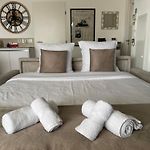 Q&R Renting - Appartement luxueux et Suites design- Parking AC Mer