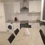 Renovated Airport Apartments: Transit Hub With Parking