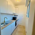 Beach And Sun Two Minutes Away