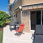 Lovely Apartment With Private Garden And A Swimming-Pool