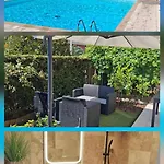 Lovely With Private Garden And A Swimming-pool Apartment *